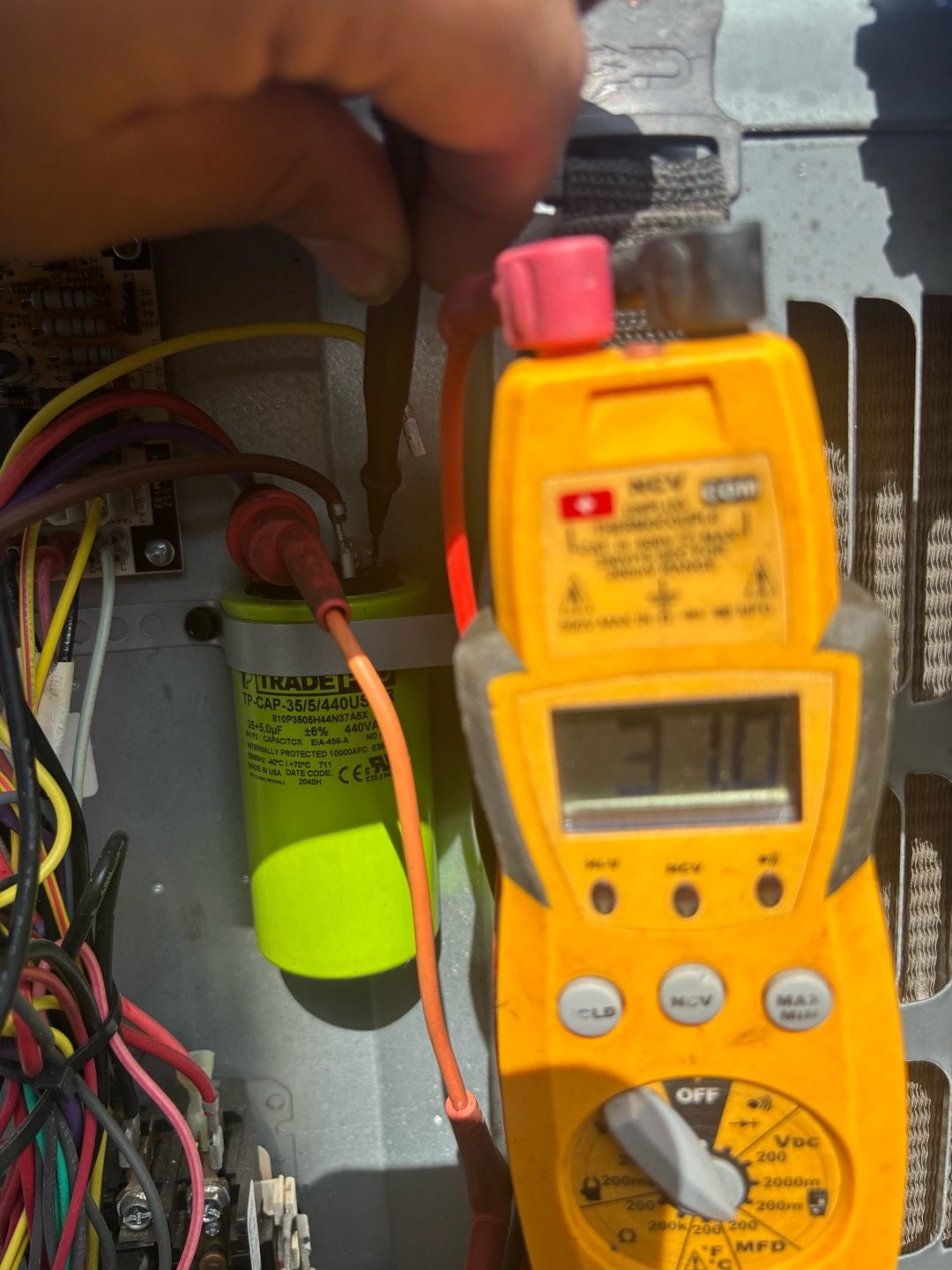 Microfarad test showing a weak run capacitor during a Sanford AC tune-up