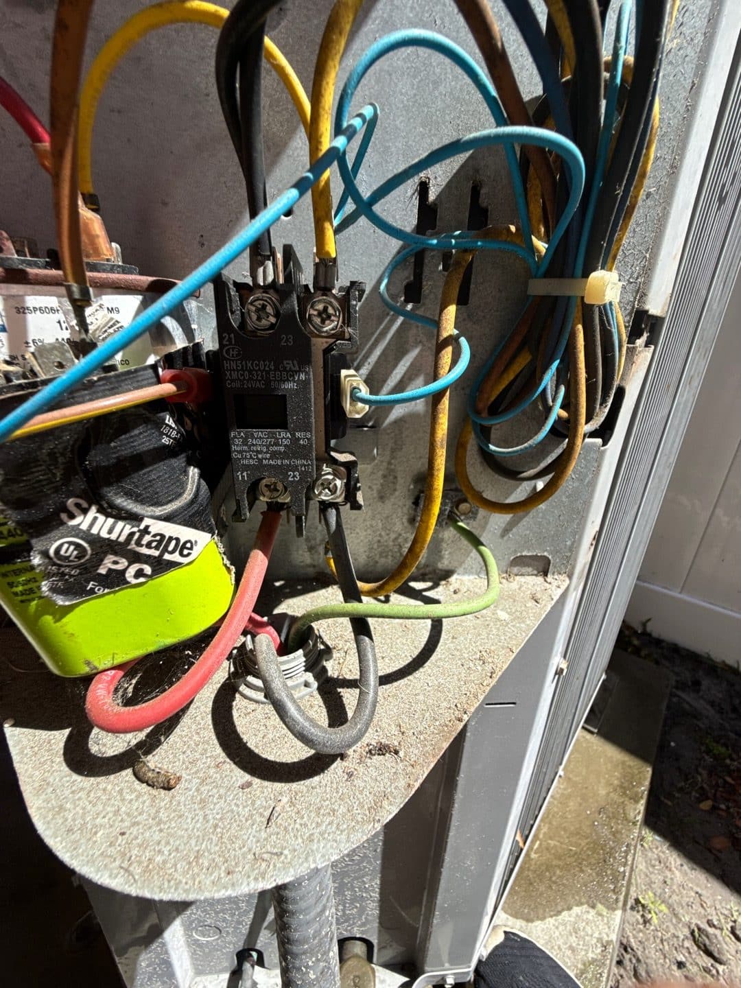 Contactor and wiring inspection on a commercial AC system during preventive maintenance