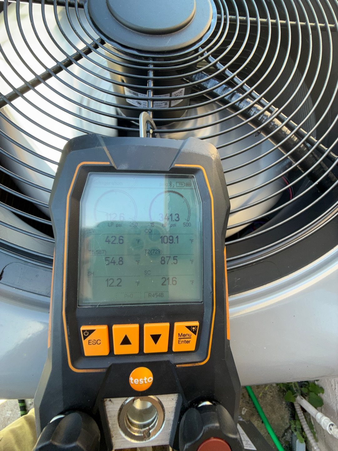 Smart manifold checking an R-454B system during commercial HVAC maintenance on Merritt Island